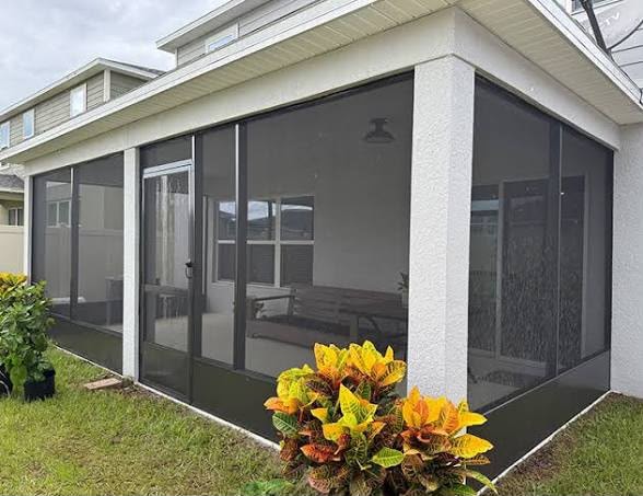 Screened lanai enclosure with dark frames